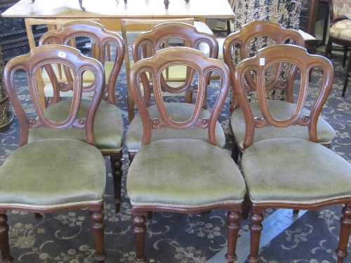 A set of six late 19th century mahogany framed dining chairs with later upholstered seats.