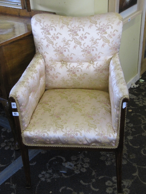 An early 20th century Edwardian chair with satin inlay on four original castors, (possibly re-