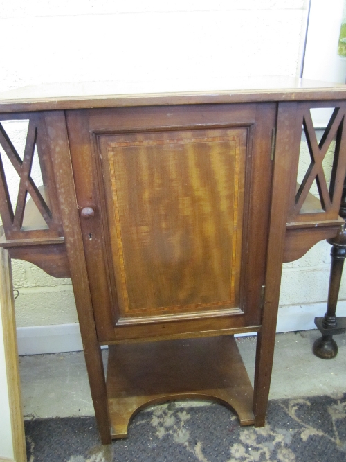 An Edwardian line inlaid mahogany bedside cabinet.