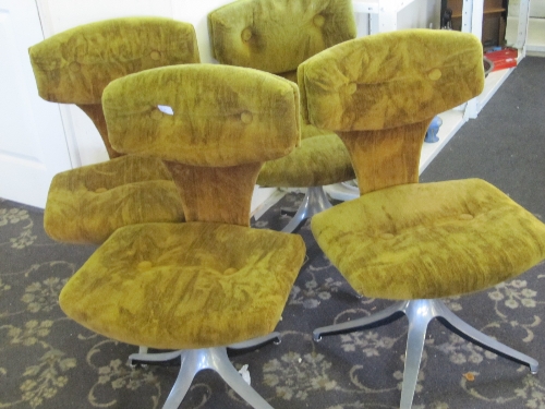 A set of four late 20th century cushion seat and back Howell office/dining chairs (a division of
