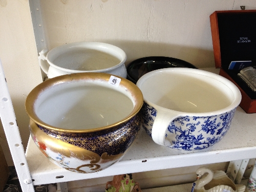Three various china chamber pots together with a Royal Stanley Ware Jacobean design fruit bowl.