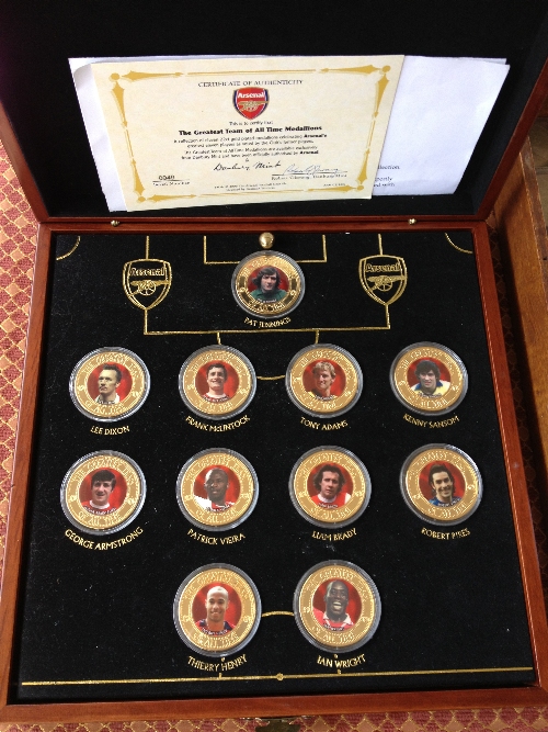 An Arsenal football team Danbury Mint collection of commemorative medals.