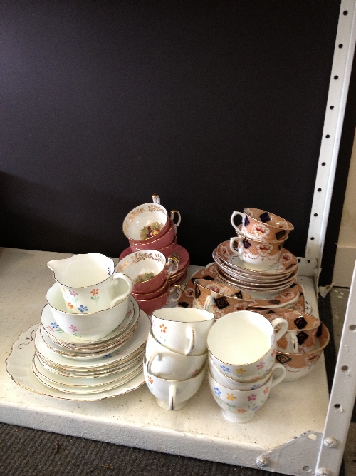 The residue of three various china teasets including Aynsley fruit decorated set.