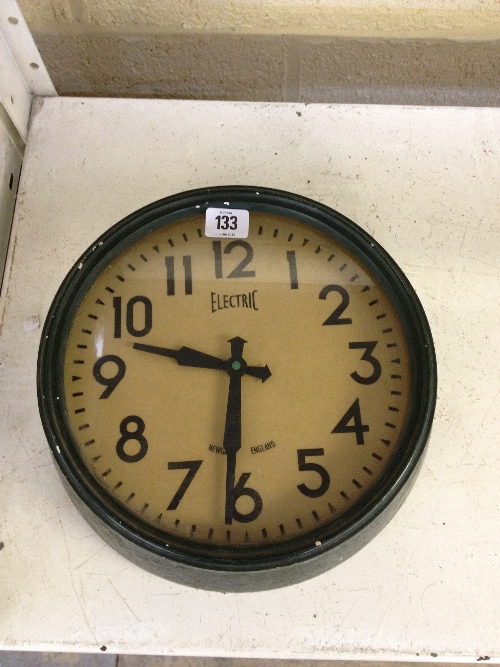 An Art Deco style wall clock (battery operation).