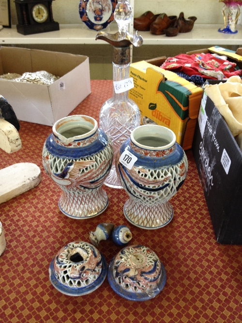 A silver necked cut glass decanter together with a pair of Chinese vases (latter both af).