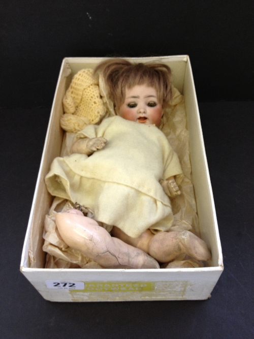 An early 20th century Bisque head jointed doll (head loose).