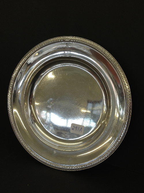 A Christofle silver plated salver decorated with a nautical anchor to rim.