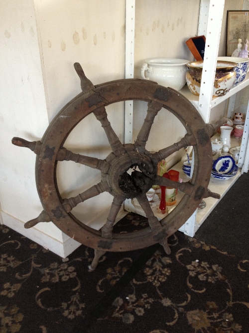 A ship`s wheel.