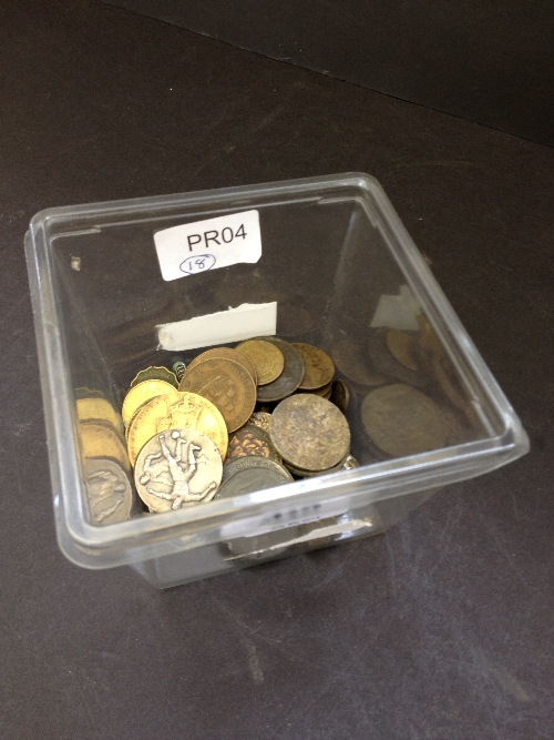 A carton containing a small quantity of various coins.