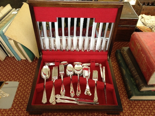 A modern silver plated canteen of cutlery.