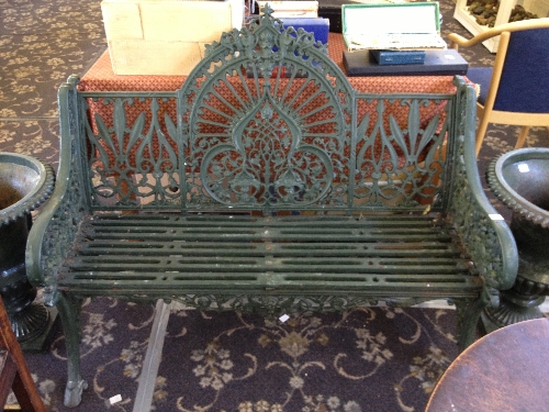 A heavy cast iron Coalbrookdale style two seater garden bench.