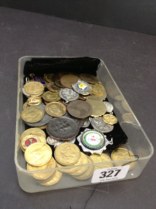 A carton of tokens and coins.