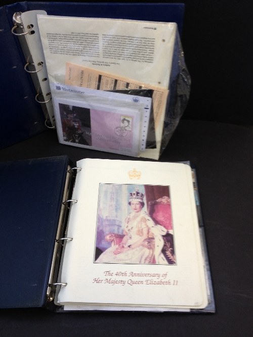 Two stamps albums containing Royalty related stamps.