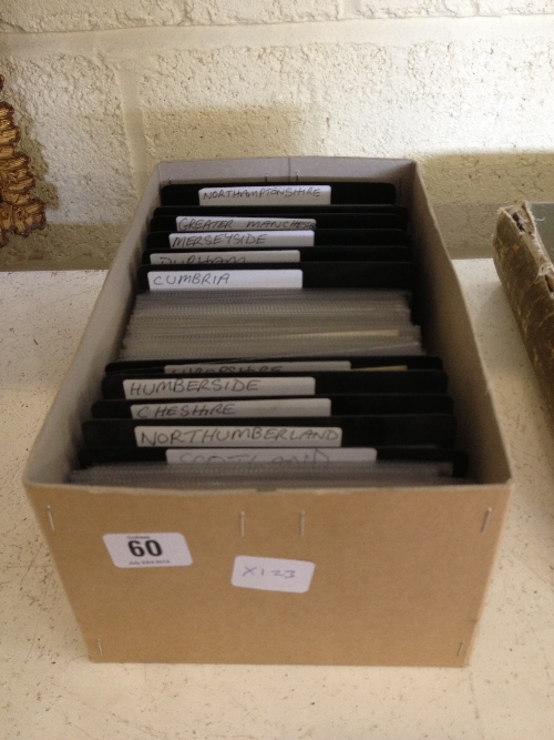 A box containing a quantity of Topographical postcards.