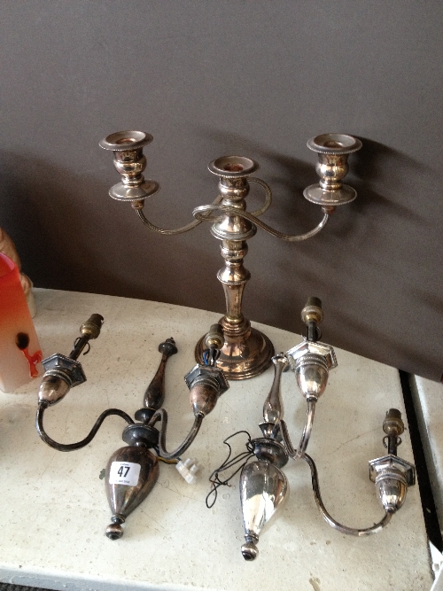 A silver plated twin branch candelabra together with a pair of plated twin branch wall lights.