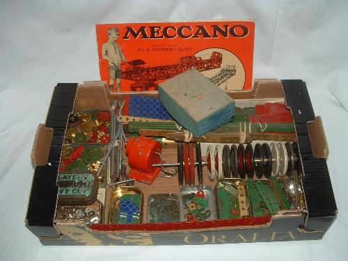 A tray containing a useful quantity of pre and post war MECCANO including numerous gears and a