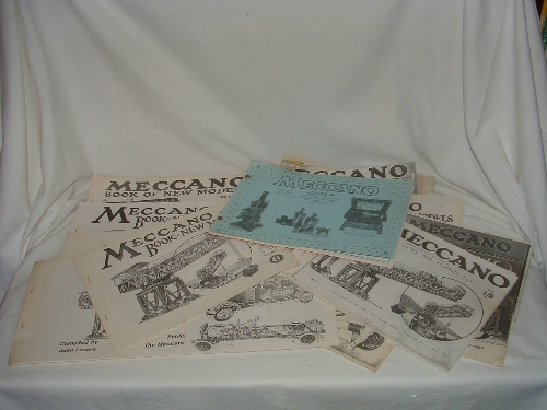 A collection of incomplete pre war MECCANO Instruction Books and numerous copies of Instruction