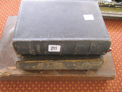 A 19th century leather bound copy of Brown`s Bible together with another and an 1878 Leisure Hour