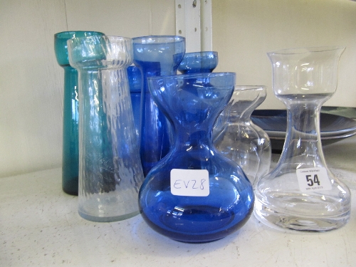 Eight various glass hyacinth bulb vases.