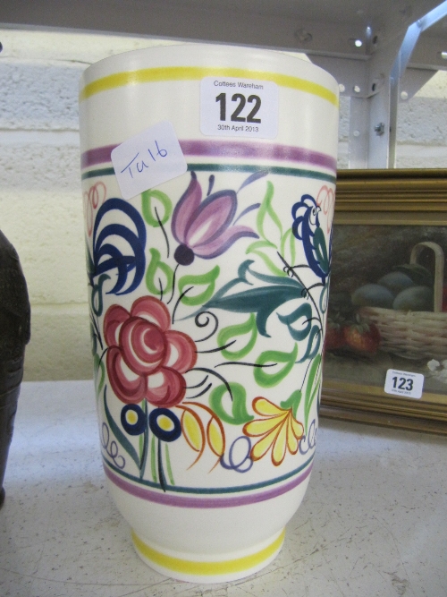 A Poole Pottery white bodied cylindrical vase decorated in the LE pattern.