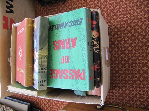 A box of mid 20th century hardback books.