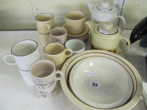 Various Poole Pottery table ware items.