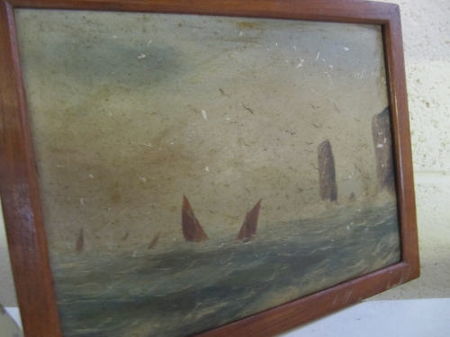 An early 20th century oil on board: Sailing Ships at Sea off Rocks.