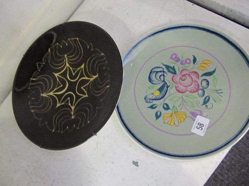 A Poole Pottery Aegean dish, shape 4, decorated in a stylised floral pattern on brown ground
