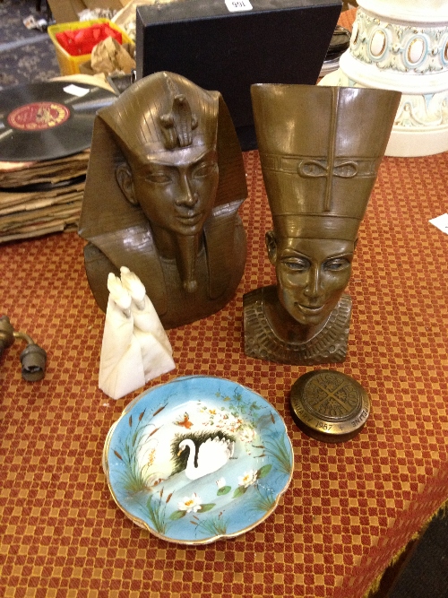 Two modern bronze effect Egyptian busts together with a pair of alabaster parrot bookends, two china