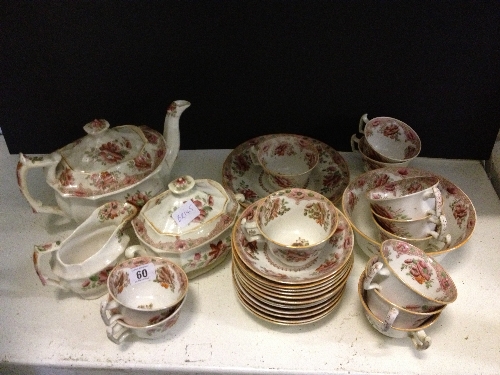 The residue of a late 19th century Staffordshire china tea service decorated in a floral pattern
