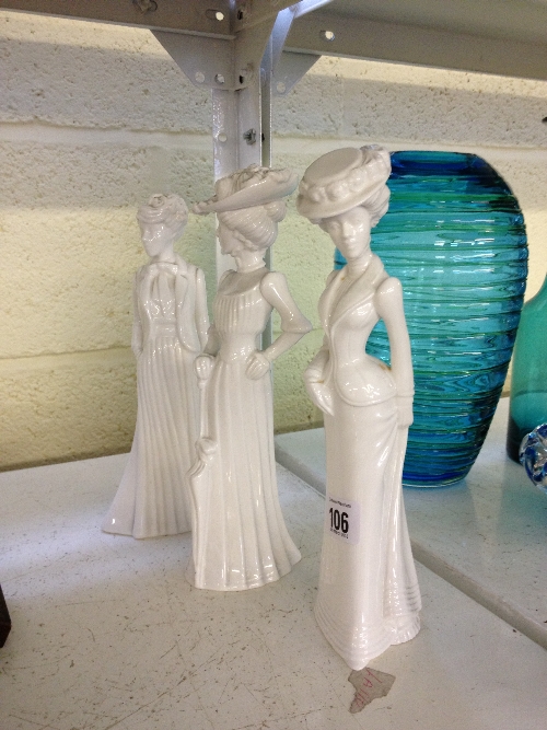 A set of three white glazed Spode china figures modelled by Pauline Shone.