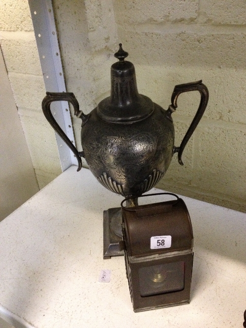 An early 20th century pewter (EPBM) twin handled urn shaped samovar together with a metal signal