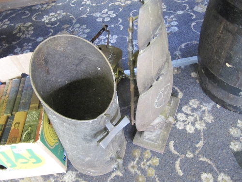 A cast iron galleon fireside companion set together with a brass kettle on stand and a coal