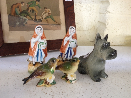 A pair of Beswick china models of green finches (2105) together with a china model of a Scotty Dog