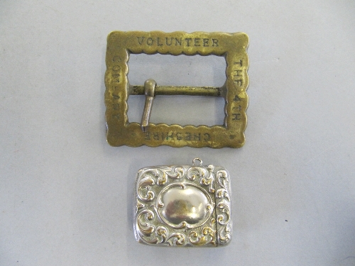 A brass 4th Cheshire Volunteer Company belt buckle together with a silver plated Vesta case.