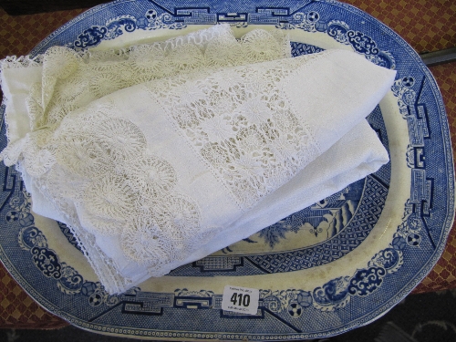 A 19th century blue and white china Willow pattern meat plate together with two drawn lace table