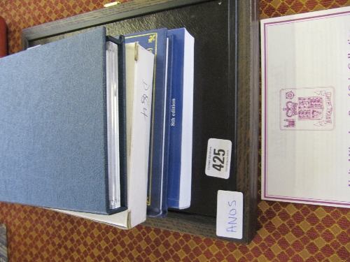 A wooden Krugerand storage box together with a gold sovereign reference book, English Paper Money