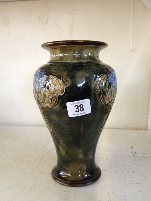 A Royal Doulton stoneware Art Nouveau design vase decorated with stylized flowers by LP.