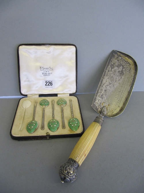 An early 20th century cased set of five silver and enamel teaspoons together with a 19th century