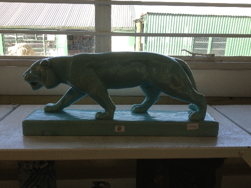 A large Art Deco style crackle glaze china model of a panther.