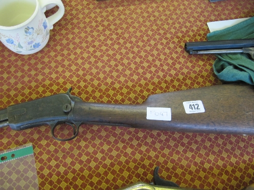 A de-activated Winchester pump action rifle, .22 with original de-activation certificate, signed and