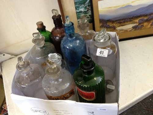 A collection of 10 early 20th century apothecary bottles.