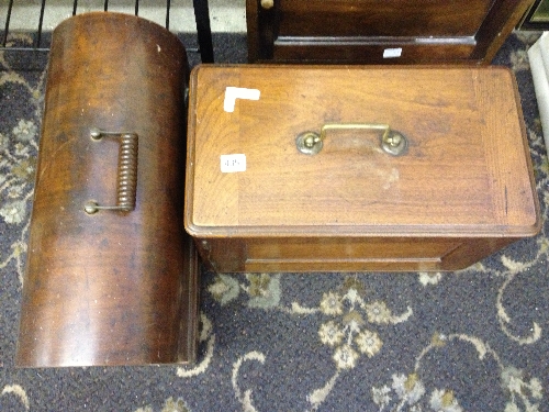 Two cased Singer sewing machines.