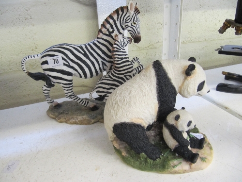 A Nature Craft large resin model of a zebra and foal together with a resin model of a panda and