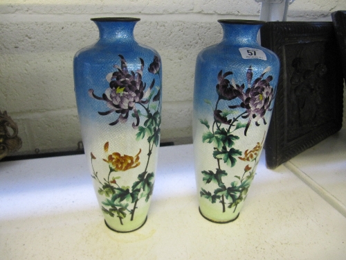 A pair of early 20th century good quality Cloisonne vases decorated with flowers (one af).