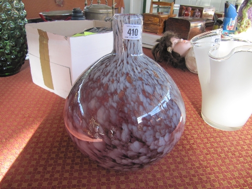 A round decorative coloured Art glass vase.