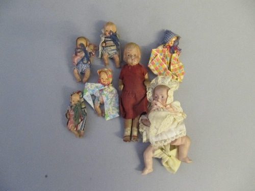 A small collection of various early 20th century dolls.