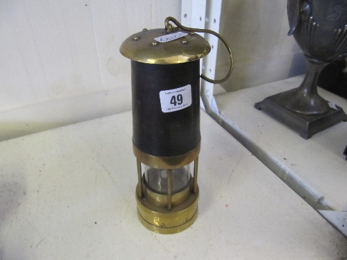A brass miner`s lamp (no maker`s name).