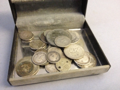 A small quantity of silver coins.