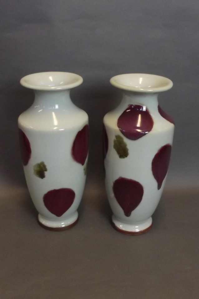 A pair of Chinese flambé splashed vases, impressed 4 character seal to base, 14¼'' high